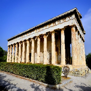Ancient Agora Of Athens in Greece - a public space in ancient Athens that served as the center of political, commercial, and social activity, featuring ruins of historic buildings such as the Temple of Hephaestus and the Stoa of Attalos.