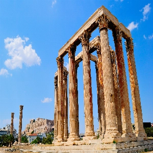 Temple Of Olympian Zeus in Athens, Greece - a massive ancient temple dedicated to Zeus, featuring towering columns and ruins, and a fascinating glimpse into the architectural and cultural legacy of ancient Greece.