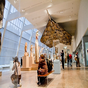 A stunning interior view of the Museum of Modern Art, showcasing a variety of contemporary artworks and installations.